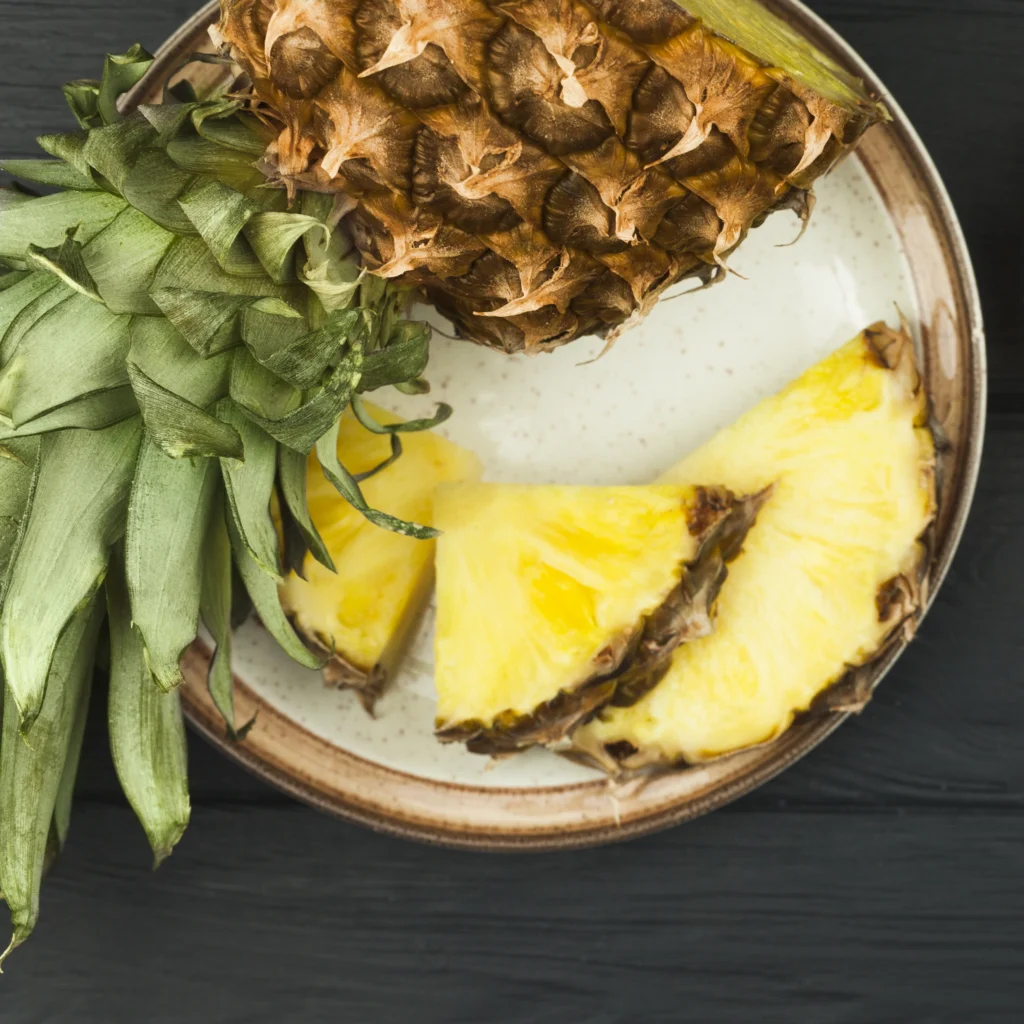 slices of pineapple with green leaves